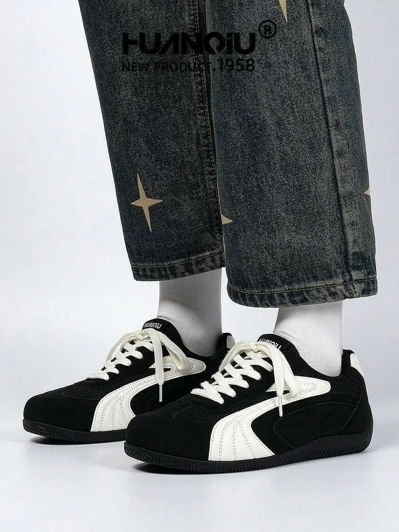 sznurowane czarne buty sportowe