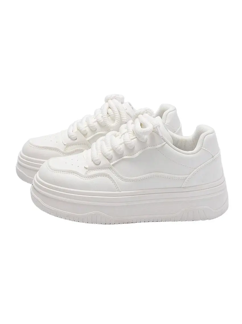 białe sznurowane buty sportowe