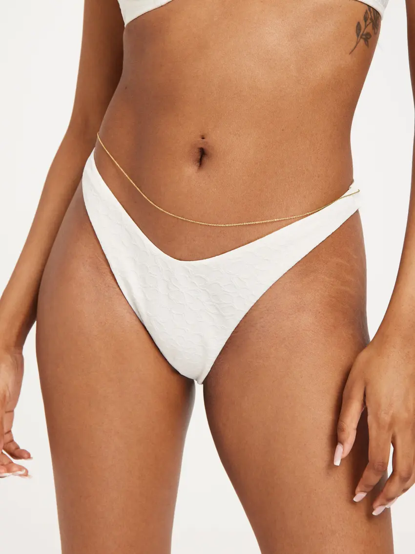 biały dół od bikini asymetria tekstura kwiaty