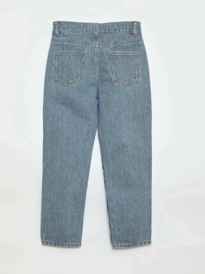 niebieskie spodnie jeans paski