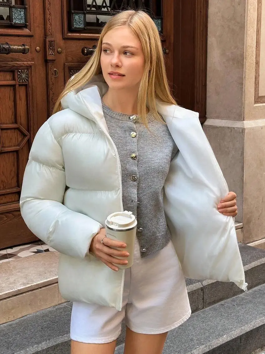 biała pikowana kurtka zamek