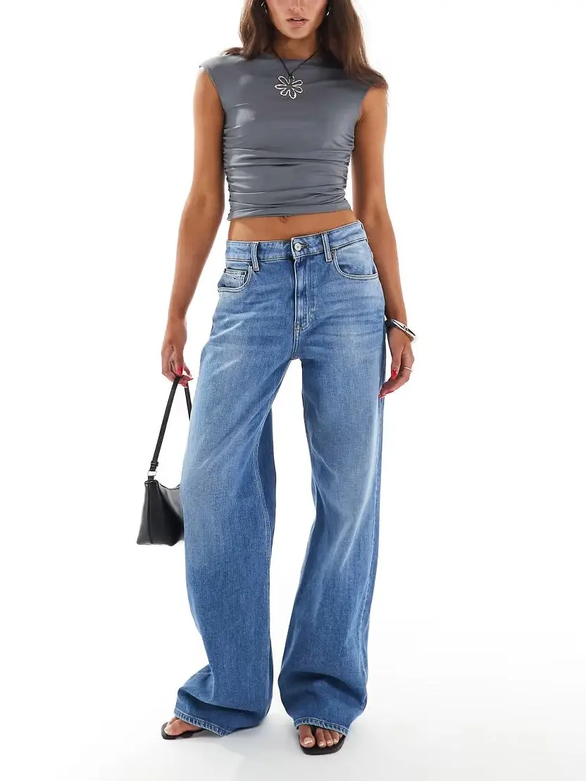 niebieskie spodnie jeans zamek
