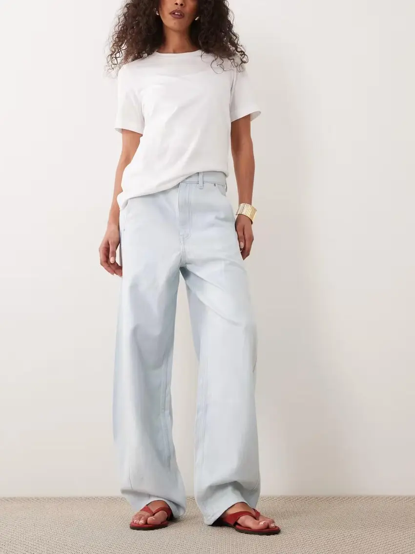 niebieskie spodnie jeans kieszenie