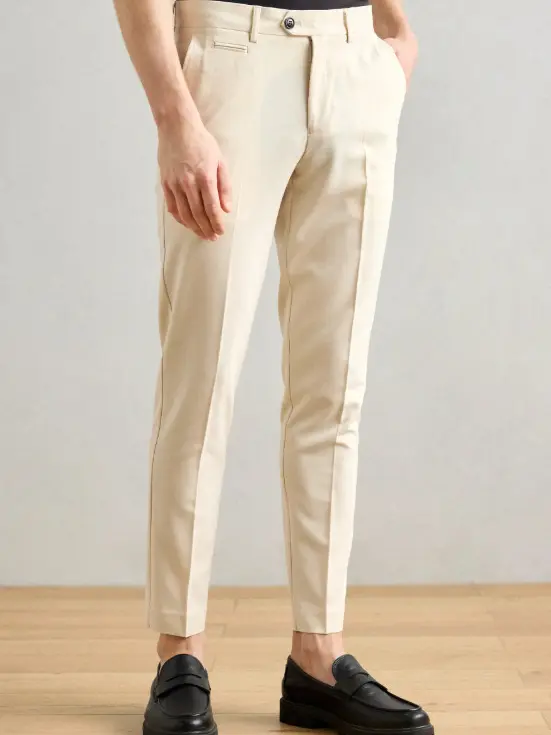 BEŻOWE SPODNIE SLIM FIT KIESZENIE ZAMEK