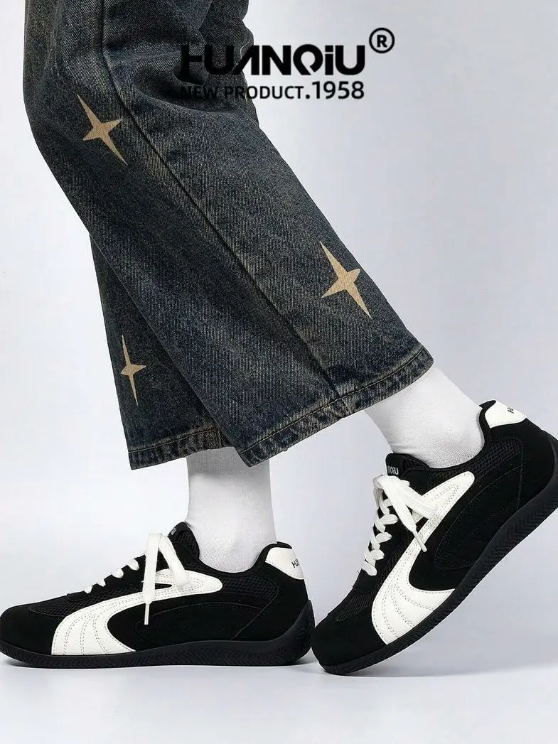 sznurowane czarne buty sportowe
