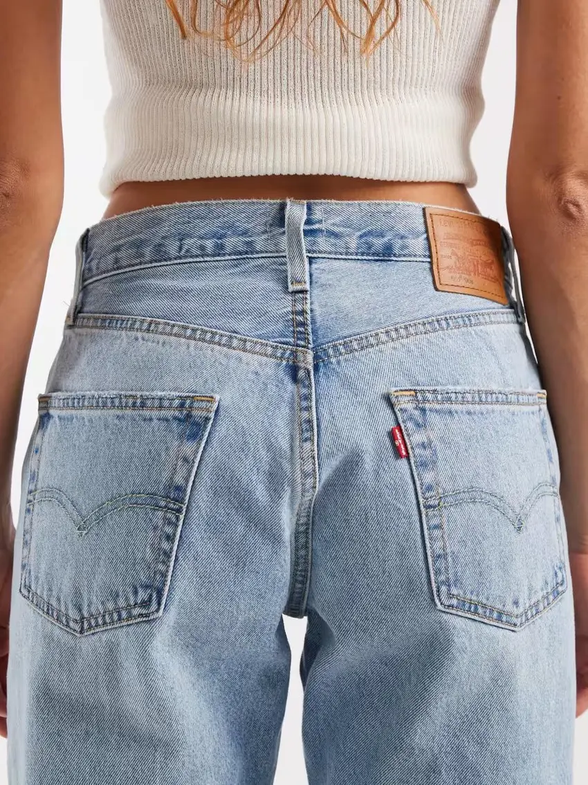 niebieskie  spodnie jeans logo