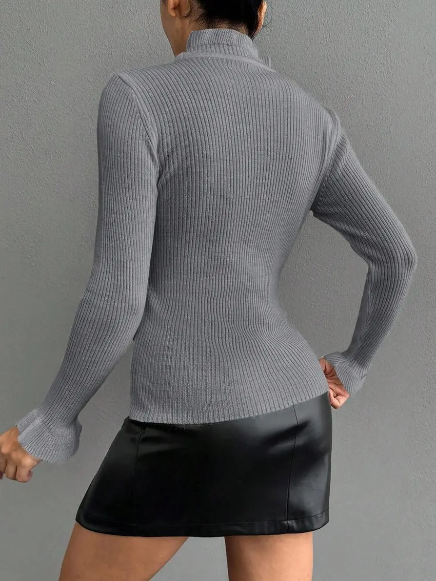 różowy sweter prążki falbanki