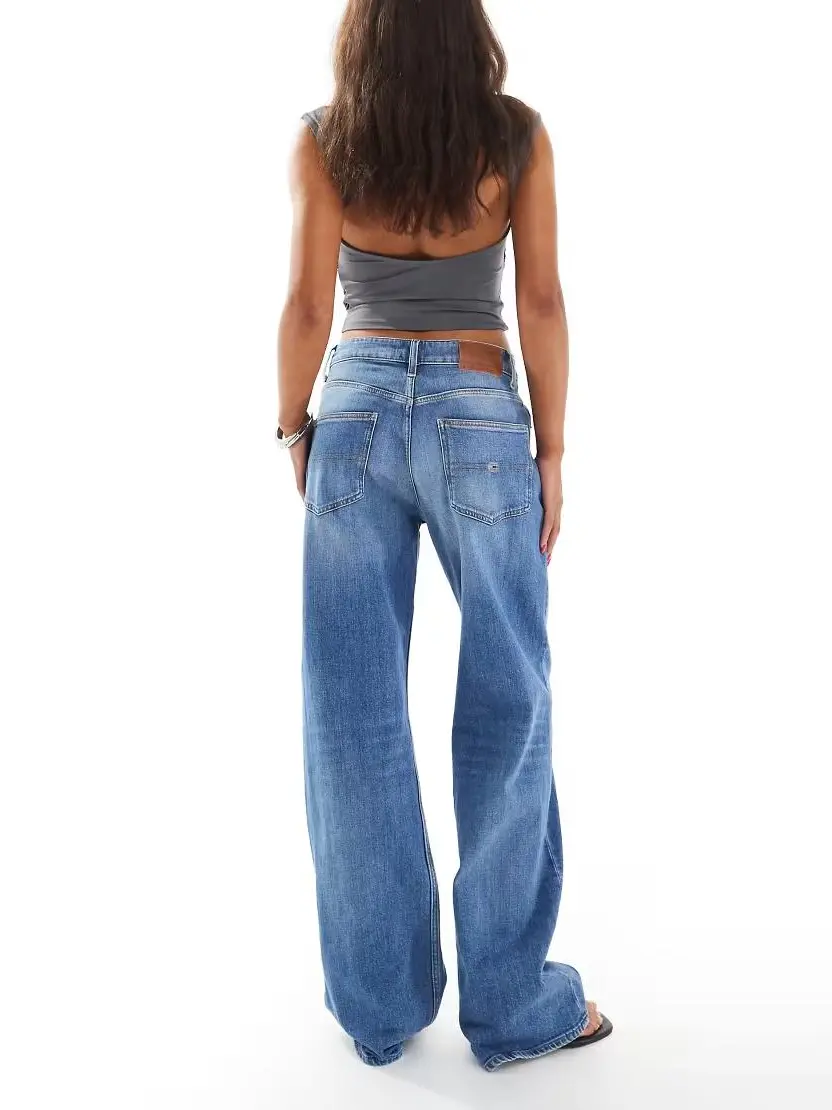 niebieskie spodnie jeans zamek