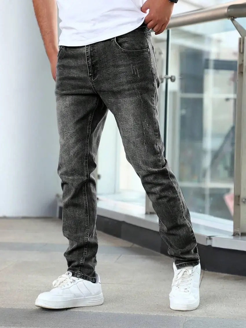 ZWĘŻANE SPODNIE JEANS