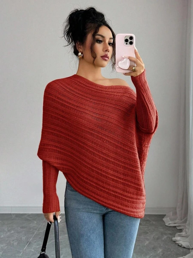 pomarańczowy sweter asymetryczne dekolt