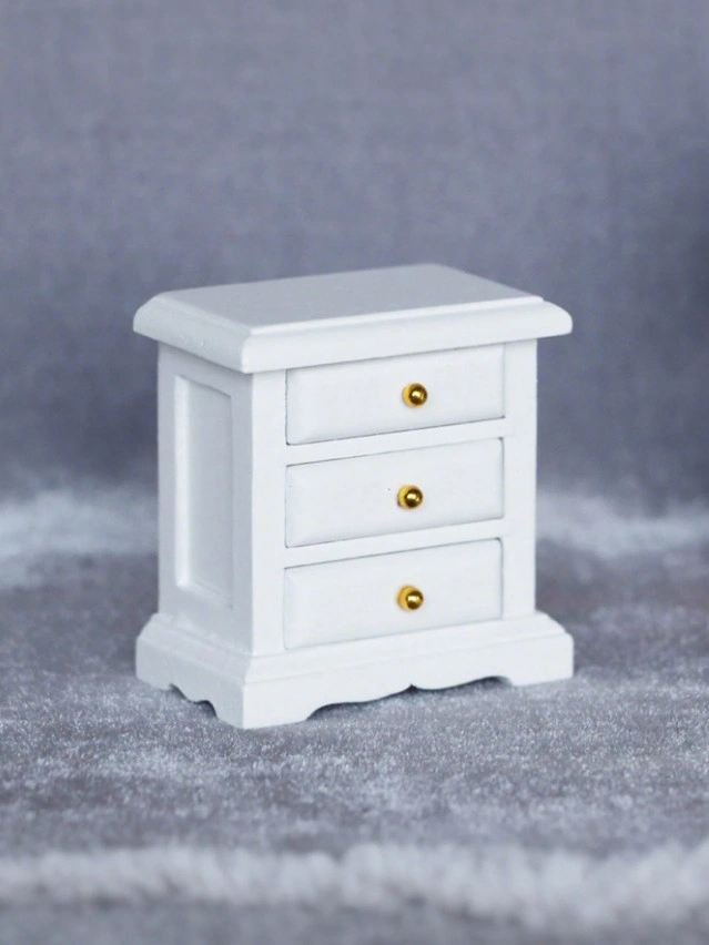 biała miniaturowa komoda